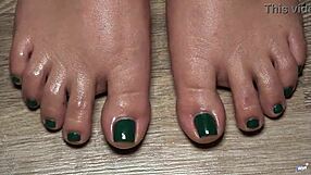 Close up of my oiled latina toes with green nails for your fetish pleasure