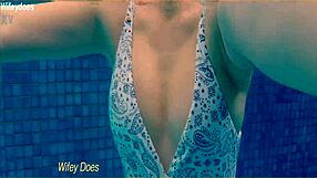 Preview of wife swimming in hotel pool wearing hot one piece swimsuit