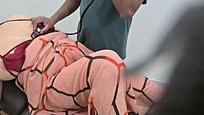 indian doctor checking lady patient in clinic