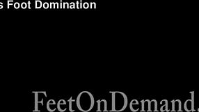 Roxanne's caged slave teases with stocking feet in femdom play