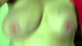 Roxie bounces her natural tits while giving a handjob