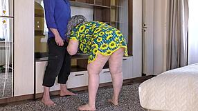 a mature woman with big tits and natural ass squeezes a cock in anal sex