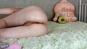 stepsister in latex gloves pissing with butt plug in ass