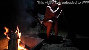 Naked couple sucking cock in forest during camping?