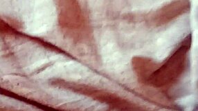 Milf spreads her pussy wide open for a teasing, intimate view