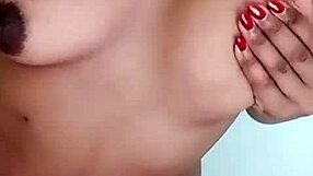 I love watching this sexy African Kenyan MILF show her yummy tits on webcam, it's so hot!