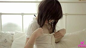 Her nipples ache as she fingers to orgasm