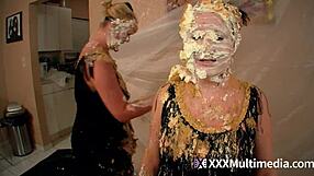 2 blondes get wet and messy and pie eachother in the face?