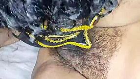 Licking hot Indian bhabhi's hairy wet pussy in homemade clip