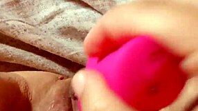 Milf spreads her pussy wide open for a teasing, intimate view