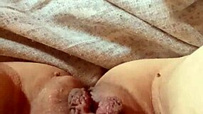 Milf spreads her pussy wide open for a teasing, intimate view