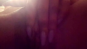 In this close-up solo scene, the pretty ebony woman with big clit masturbates by fingering her pussy