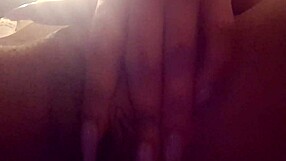 In this close-up solo scene, the pretty ebony woman with big clit masturbates by fingering her pussy