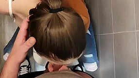 Blonde Girlfriend Giving Blowjob in University Bathroom Stall