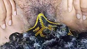 Licking hot Indian bhabhi's hairy wet pussy in homemade clip