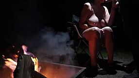 Naked couple sucking cock in forest during camping?