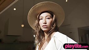 Petite latina beauty strips to reveal big juicy tits!