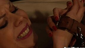 Lesbian slave moans and orgasms during strapon sex with dominant madame