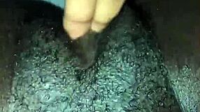 Ebony amateur masturbates her wet pussy solo