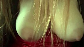 Italian MILF Artemisia Love bounces her big natural tits slowly, nipples hard in close-up.