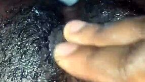 Ebony amateur masturbates her wet pussy solo