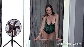 Milf Cynthia gets soaked in pee with vibrator