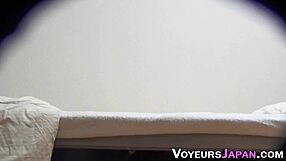 Asian teen playing with toys in hidden cam