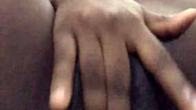 Ebony amateur masturbates her wet pussy solo