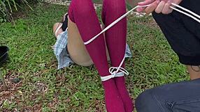 Caressing her dirty outdoor socks?