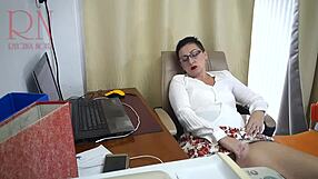 Watch the secretary getting fucked with a dildo in the office