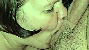 Look at this milf with big tits sucking that huge cock!