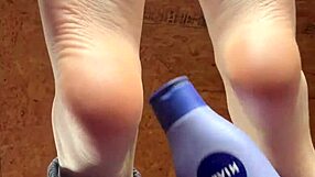 girl puts lotion on her feet 😊