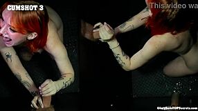 Redhead performs cumshot at gloryhole