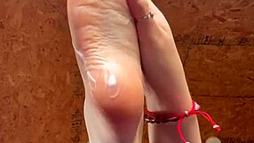 girl puts lotion on her feet 😊