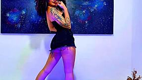 The latina babe goes wild with a big dildo, gagging as her tits shake