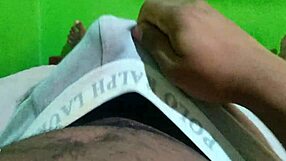 Man Performs Solo Handjob On His Black Cock In Intimate Setting