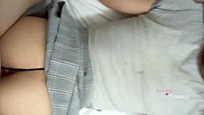 Stepsister in uniform skirt rides cock while doing homework on bed, lifting her cute long hair.