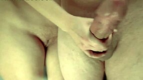 Ultra close-up handjob makes him explode on camera
