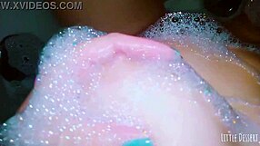 girl intensely gropes her small tits in the bath