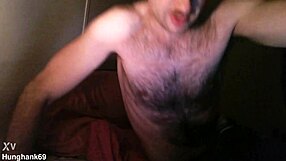 Athletic bodybuilder spits during double cock action