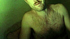 Athletic bodybuilder spits during double cock action