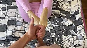 My stepsister really likes to do oil footjob and i cum on her feet