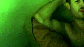 Athletic bodybuilder spits during double cock action