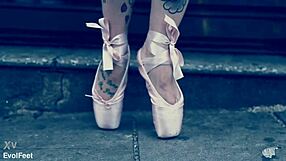 Ballerina wears ballet shoes while walking down the street