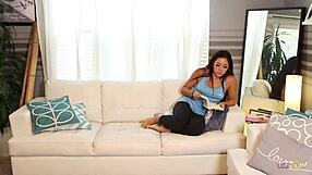 Two Stunning 20-Year-Old Girls Dive into Interracial Lesbian Sex with Kissing and Licking. They Use Toys and Vibrators on the White Sofa.