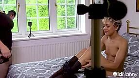 Whoa, this OldNanny model is totally seducing the photographer with her big tits during the shoot! 📸😏