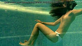 Irina Russaka Bathes Underwater In Public Pool