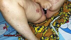 Bold housekeeper fucks with big dildo on bed