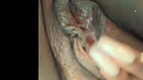 She feels so horny rubbing her pussy while thinking of that big cock.