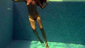 Irina Russaka Bathes Underwater In Public Pool